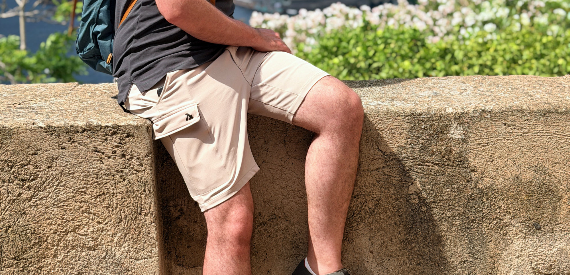 Beige travel shorts for men with waterproof cargo pocket